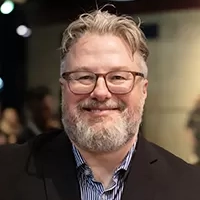 Dr. Tom Cooper